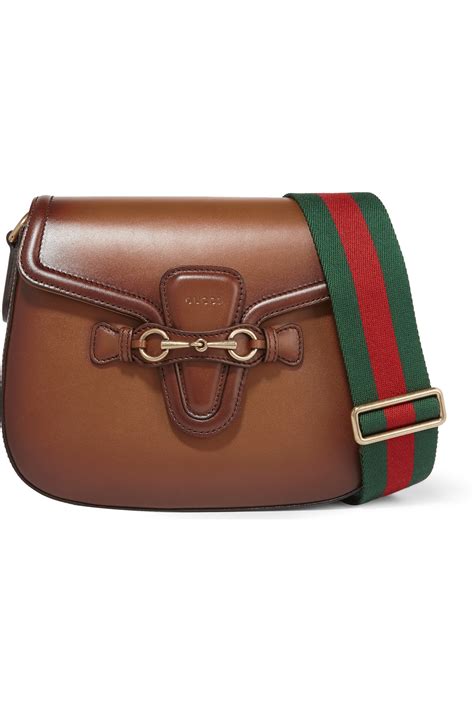 gucci bag brown small|Gucci brown leather shoulder bag.